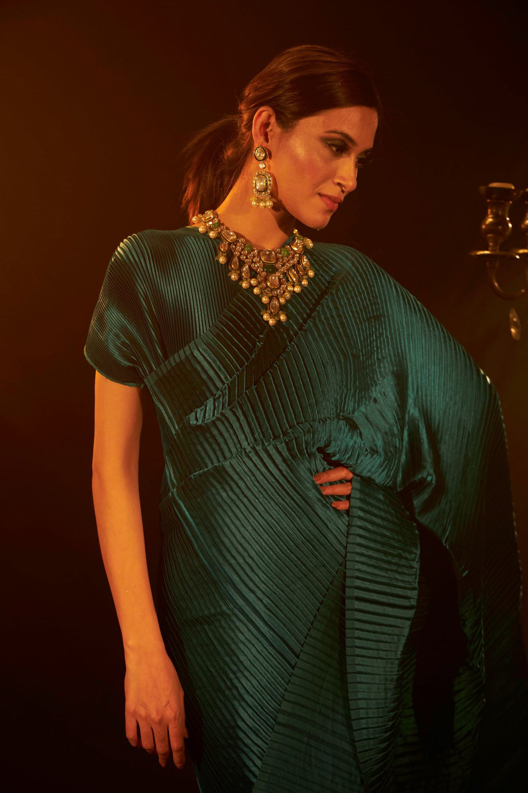 Buy Latest Designer Pleated Gown Saree & Belt in Teal Color at India's largest Fashion Brand for Women Online. Explore Collection of Sarees at Tasuvure