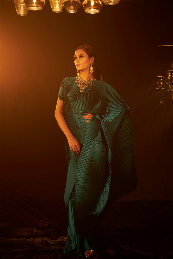 Buy Latest Designer Pleated Gown Saree & Belt in Teal Color at India's largest Fashion Brand for Women Online. Explore Collection of Sarees at Tasuvure