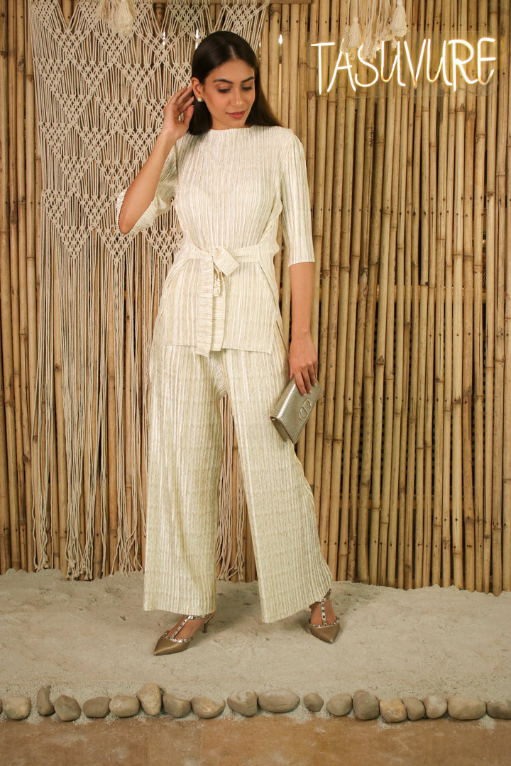 Shop Partywear Pleated Metallic Ivory Co-ord with Silhouette & Wide Leg Ankle Length Pant. Get Exclusive Co Ord Sets Online on Women Clothing Website Tasuvure