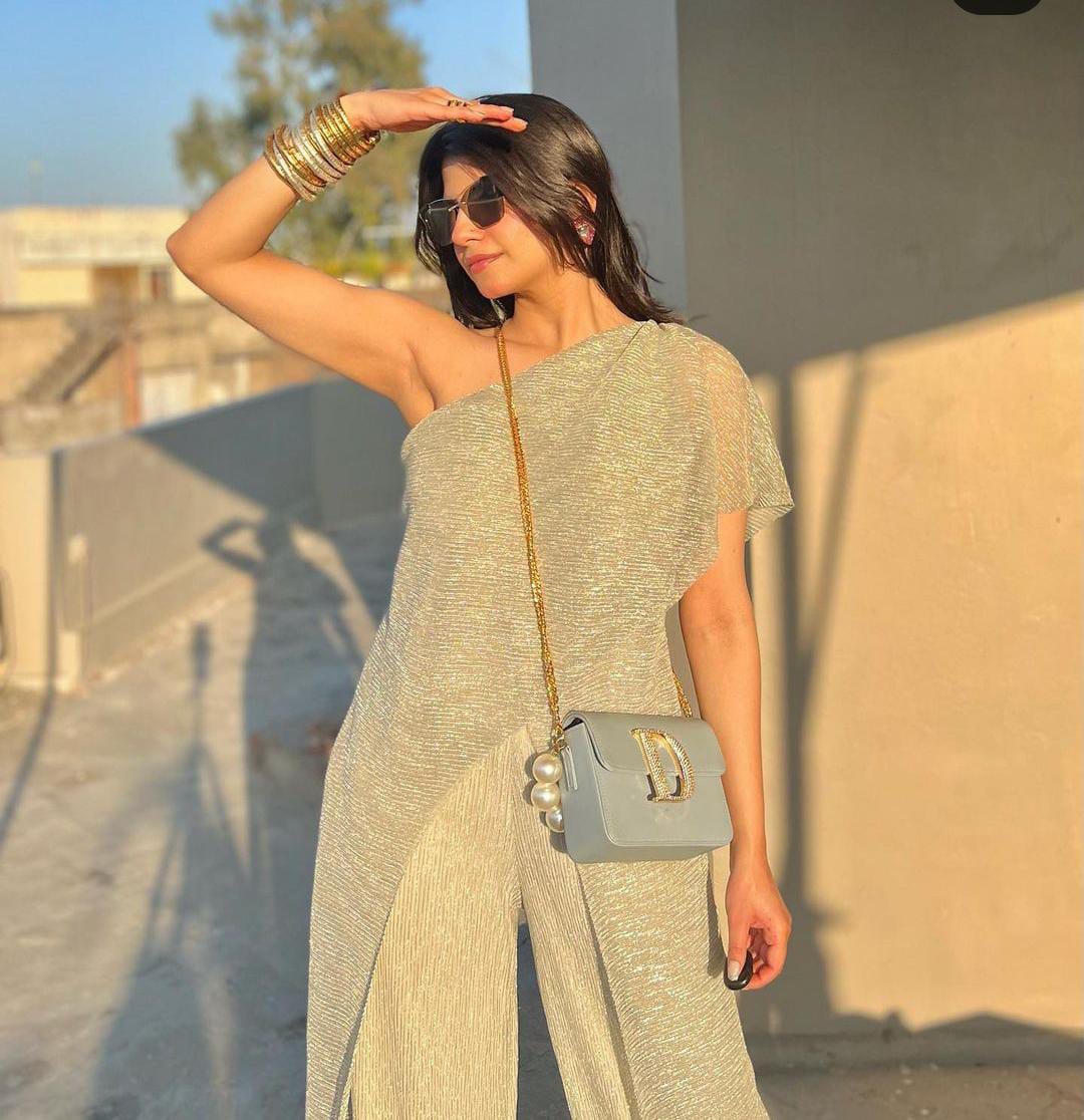 Dhriti Mehra in our Sasha Shimmer Jumpsuit - Ivory